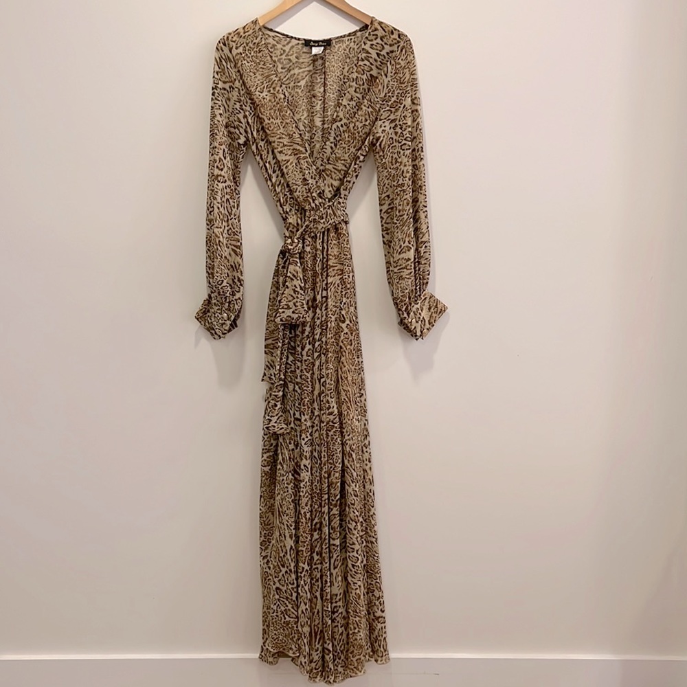 Animal print dress 100% polyester. Size S